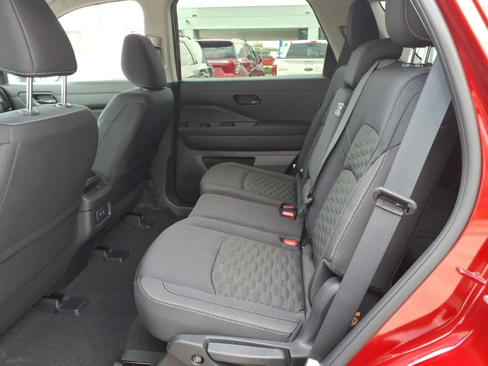 2026 Nissan Pathfinder SV Red at Robbins Nissan