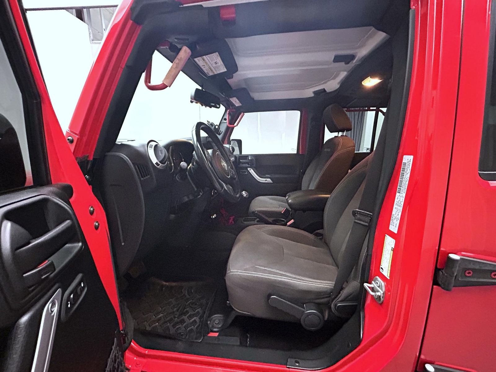 Used 2016 Red Jeep Unlimited Sahara image 10