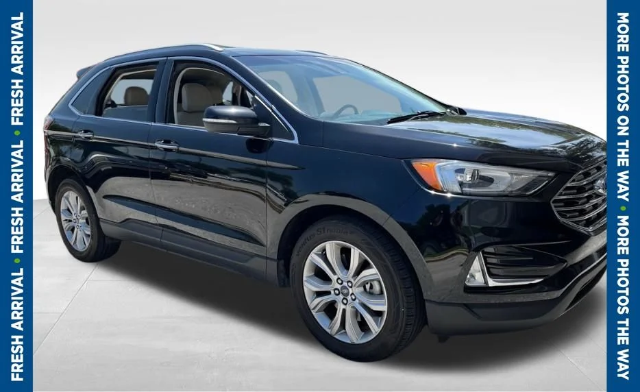 Used 2019 Black Ford Titanium image 1