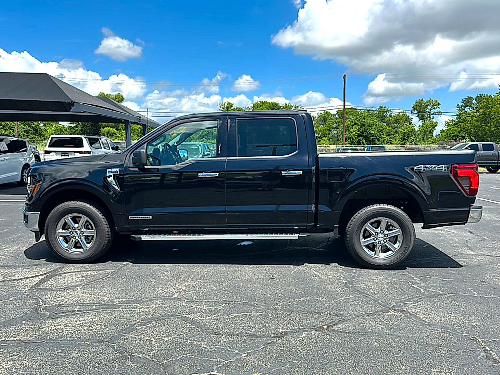 Used 2024 Agate Black Metallic Ford XLT image 5