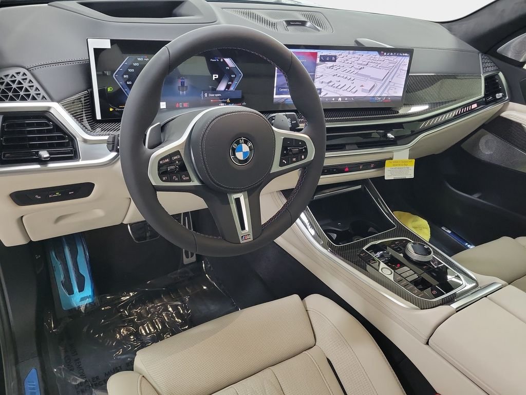 New 2026 Black Sapphire Metallic BMW M60i image 13
