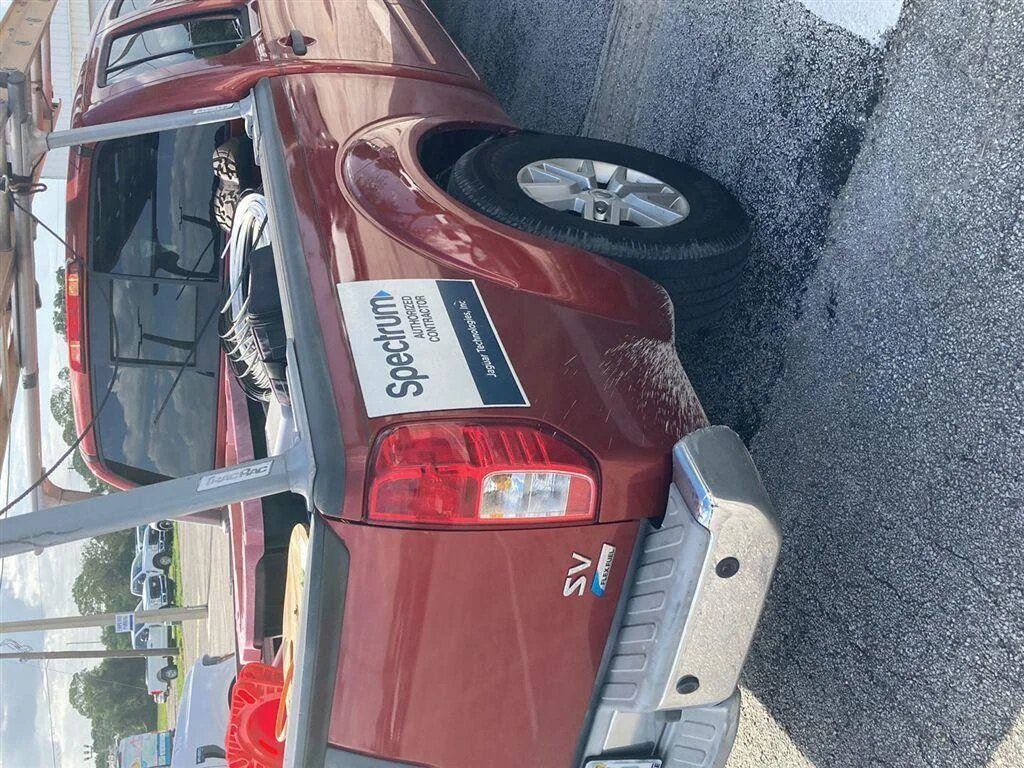 Used 2017 Lava Red Nissan SV V6 image 7
