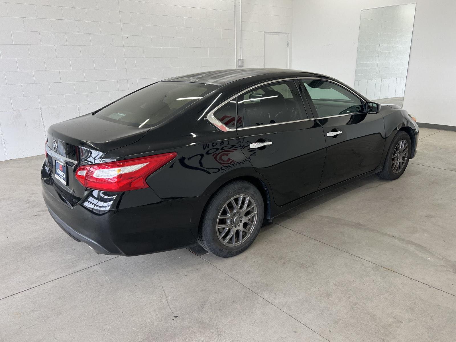Used 2016 Super Black Nissan 2.5 S image 4