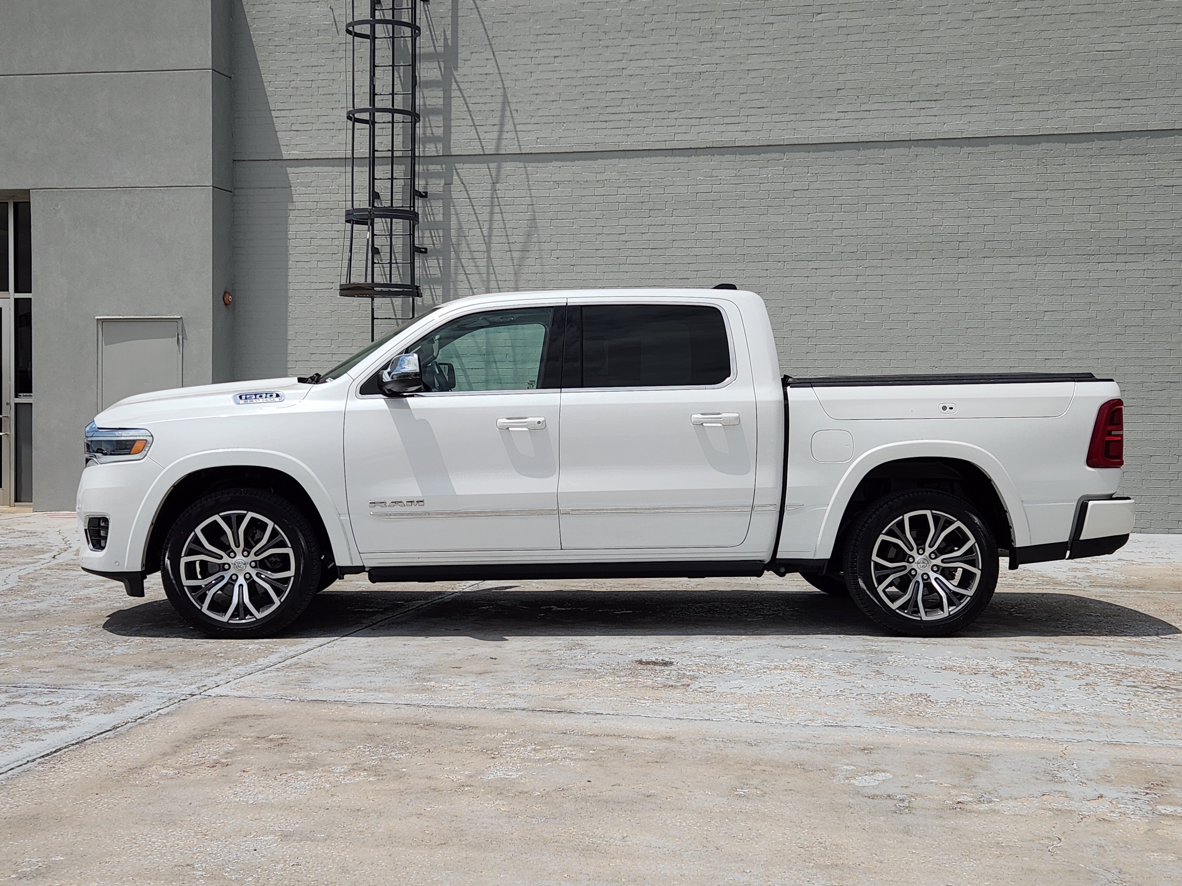 Used 2025 Ivory White Tri-Coat Pearlcoat Ram Tungsten image 5