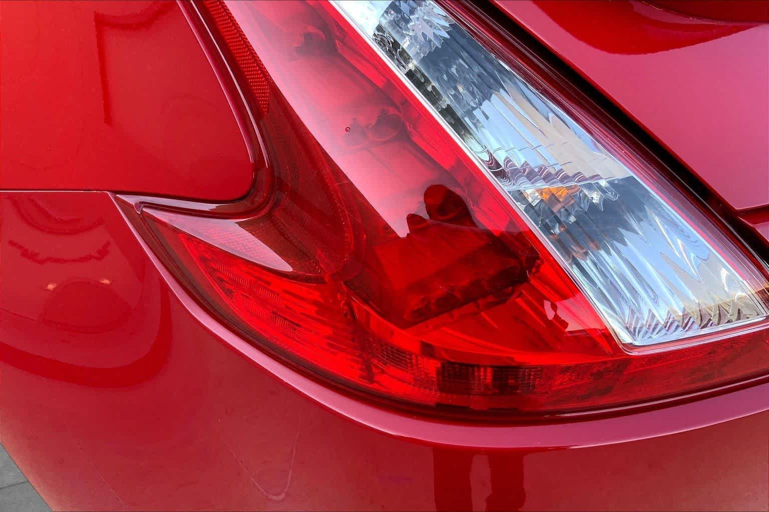 Used 2016 Solid Red Nissan Touring image 26