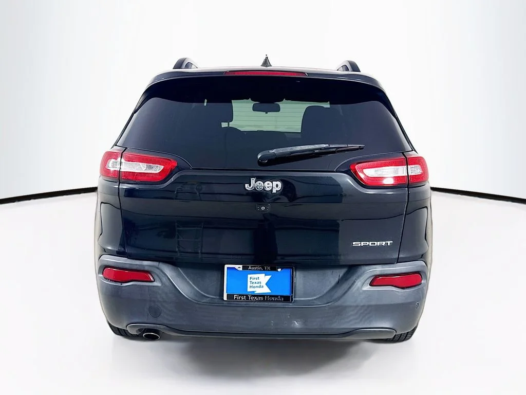 Used 2016 Brilliant Black Crystal Pearlcoat Jeep Sport image 7