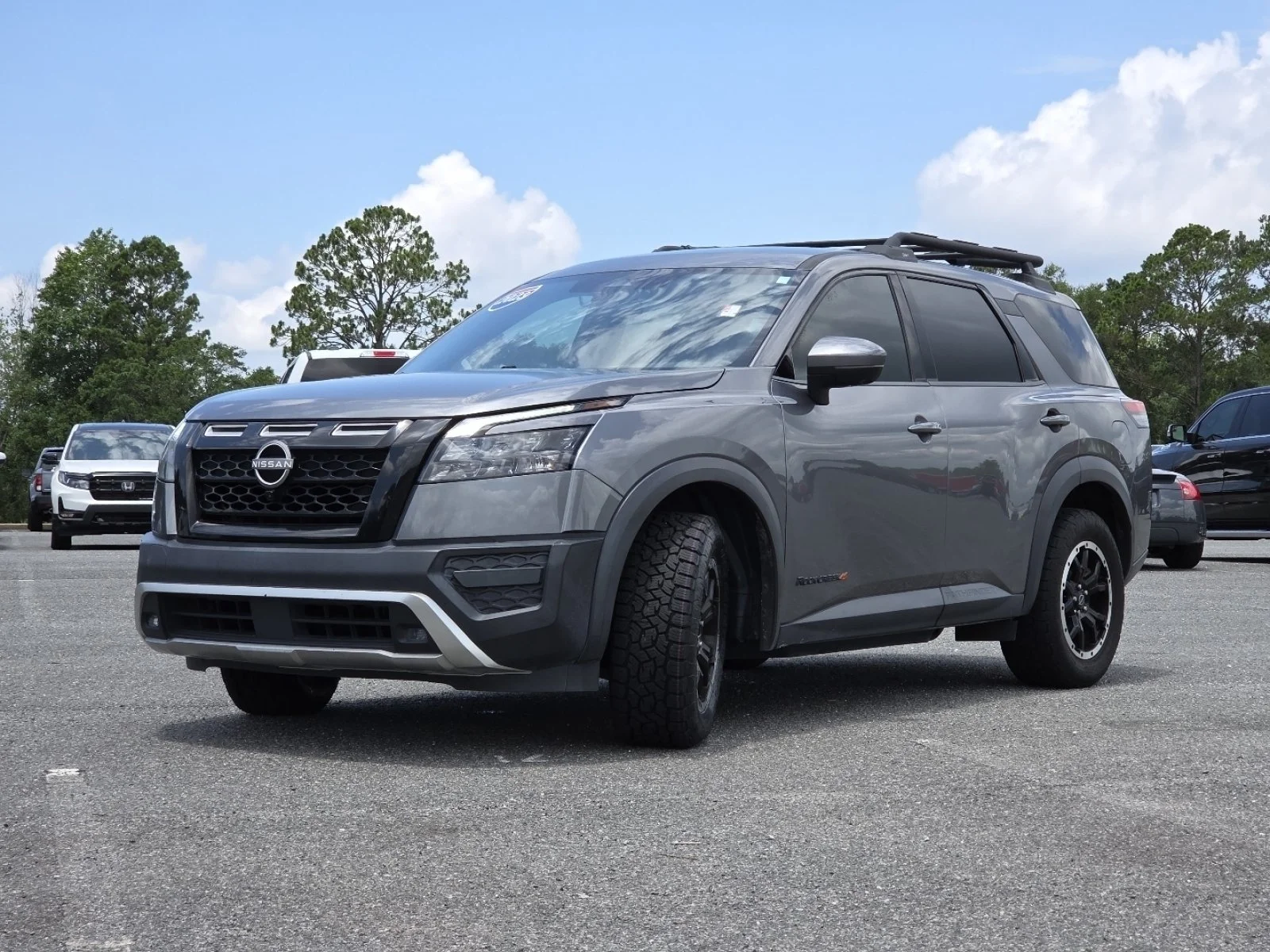 Used 2023 Gun Metallic Nissan Rock Creek 4WD image 12