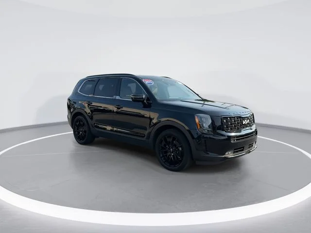 Used 2022 Black Kia SX image 1