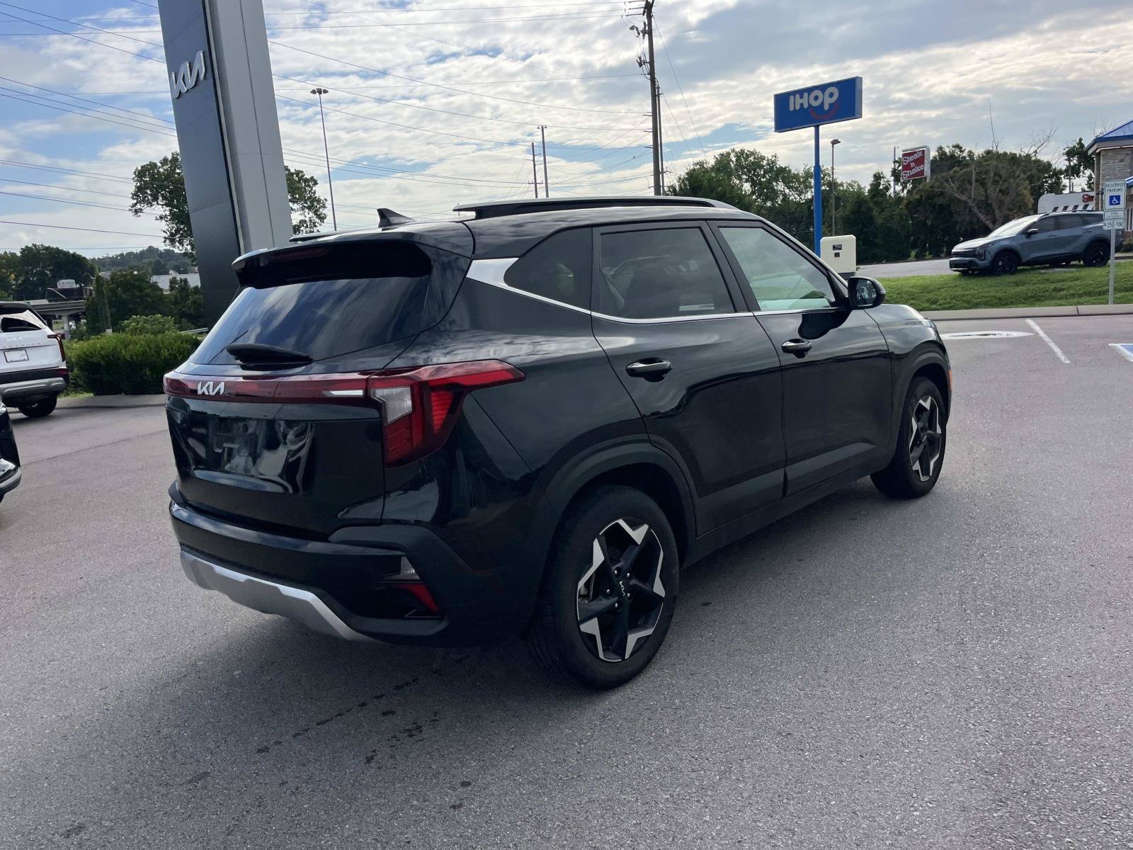 Used 2024 Fusion Black Kia EX image 3