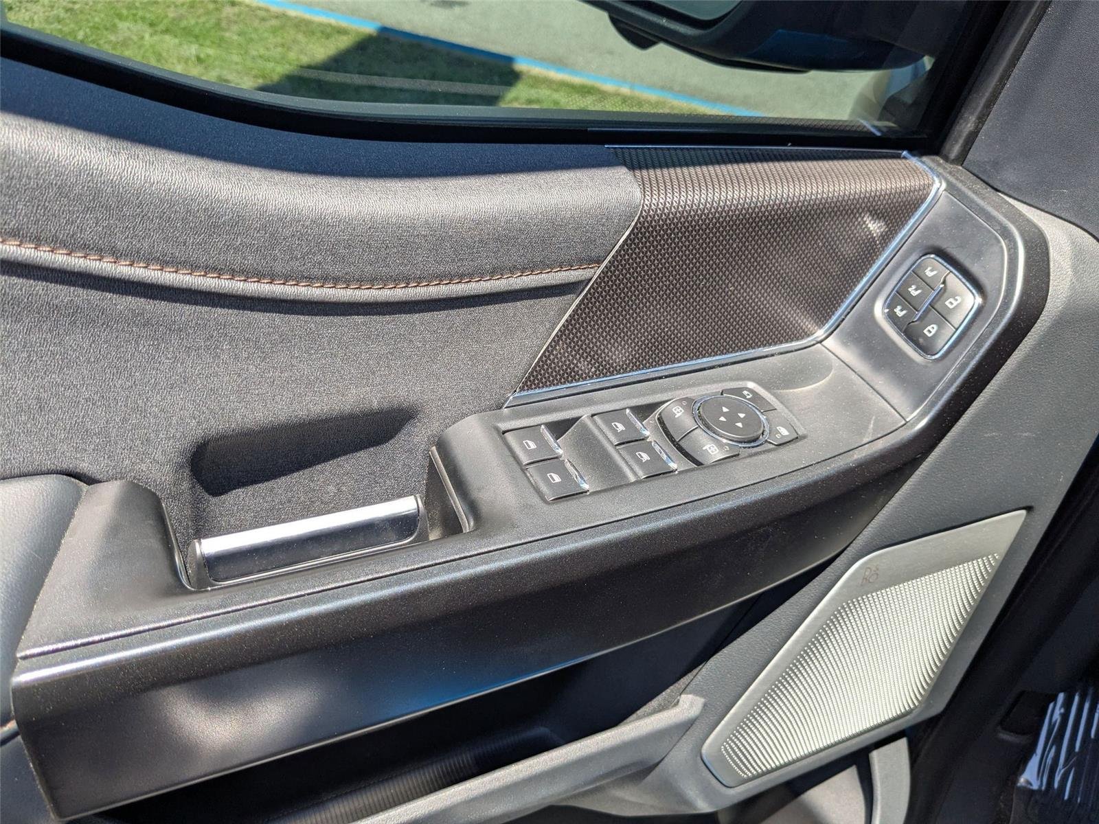 Used 2021 Velocity Blue Metallic Ford Raptor image 12