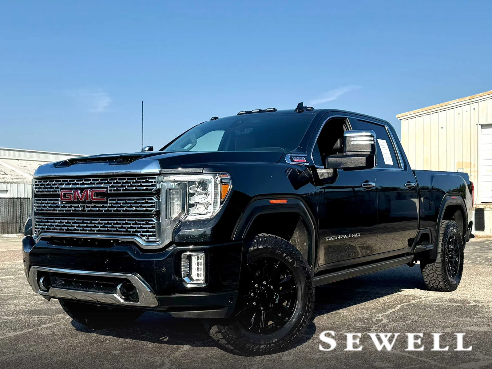 Used 2022 EBONY TWILIGHT METALLIC GMC Denali image 1