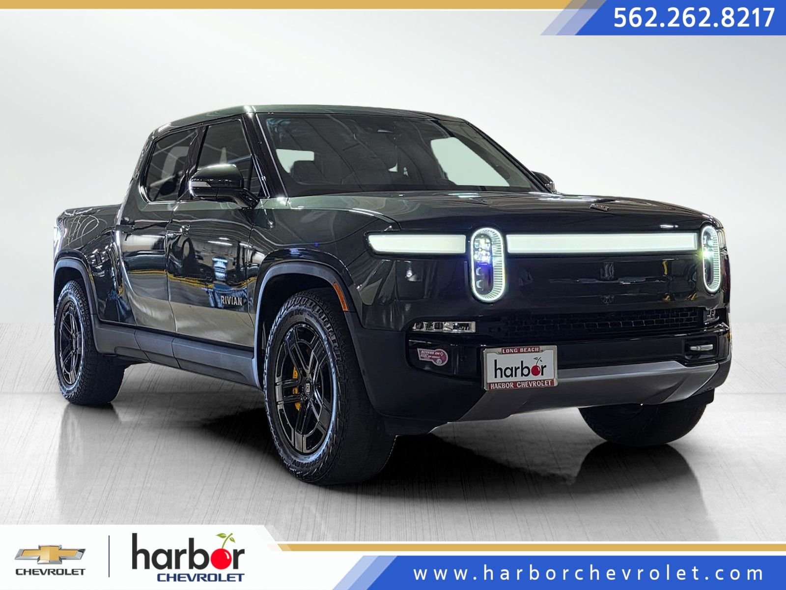 Used 2023 Forest Green Rivian Adventure image 1