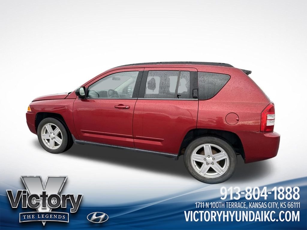 Used 2010 Red Jeep Sport image 8