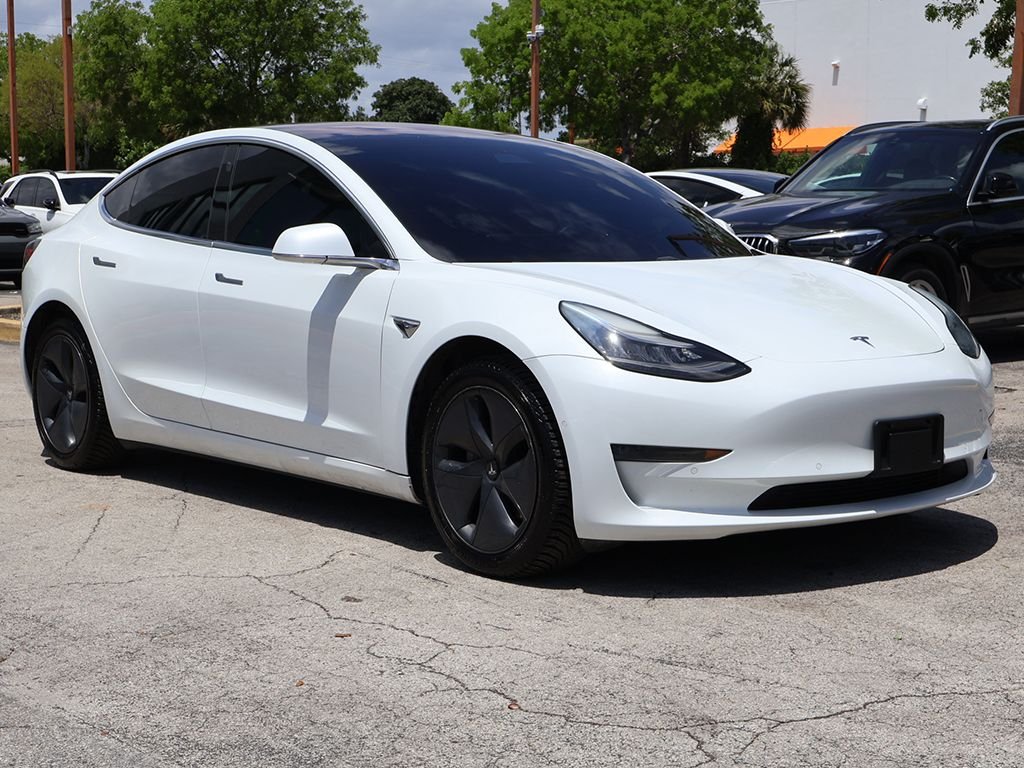 Used 2018 Tesla Model 3 Long Range Dual Motor with VIN 5YJ3E1EB6JF115557 for sale in Miami, FL