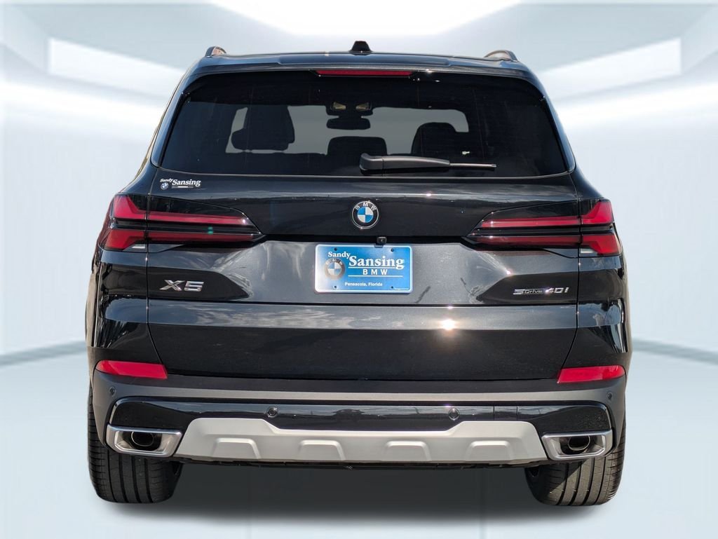 New 2026 Black Sapphire Metallic BMW sDrive40i image 4