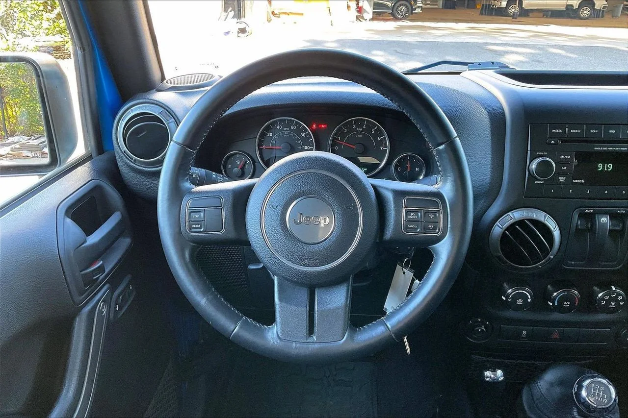 Certified Used 2016 Blue Jeep Sport image 9