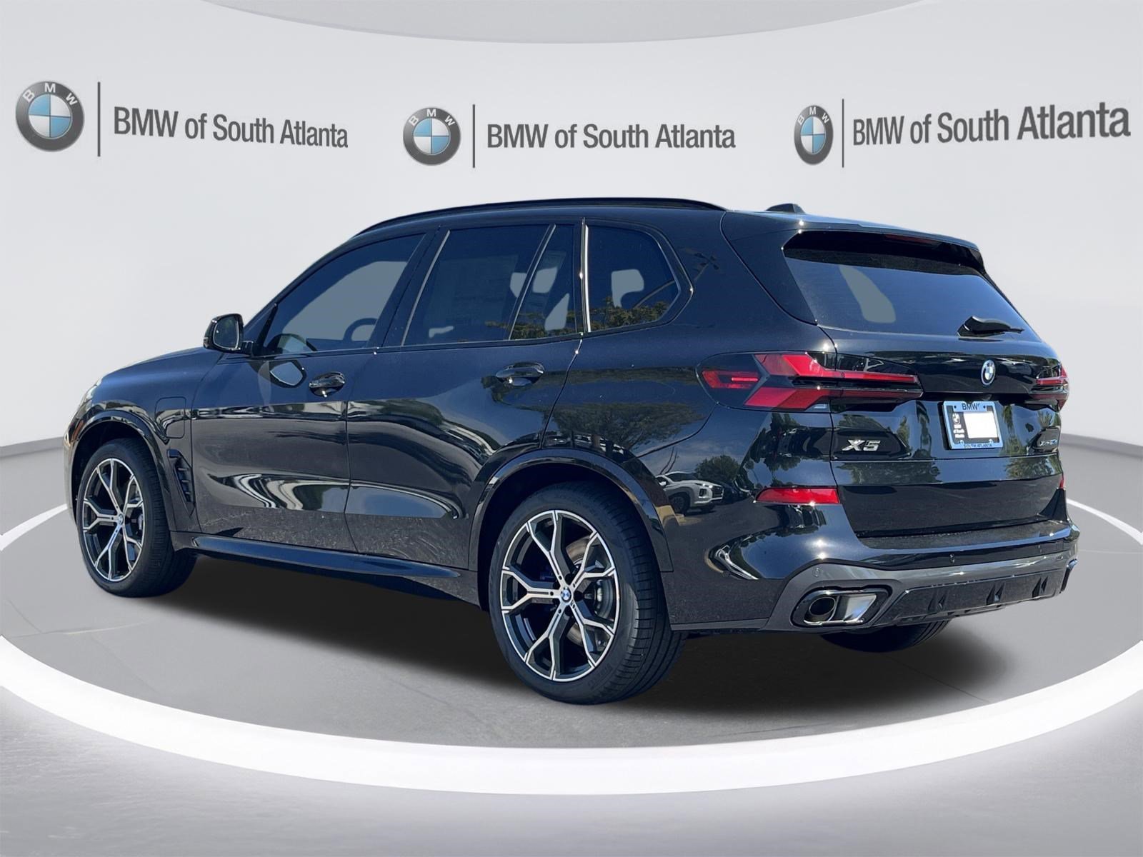 New 2026 Black Sapphire Metallic BMW xDrive50e image 24