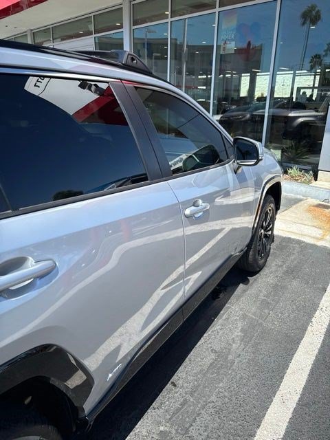 Used 2025 Silver Sky Metallic Toyota Hybrid SE image 11