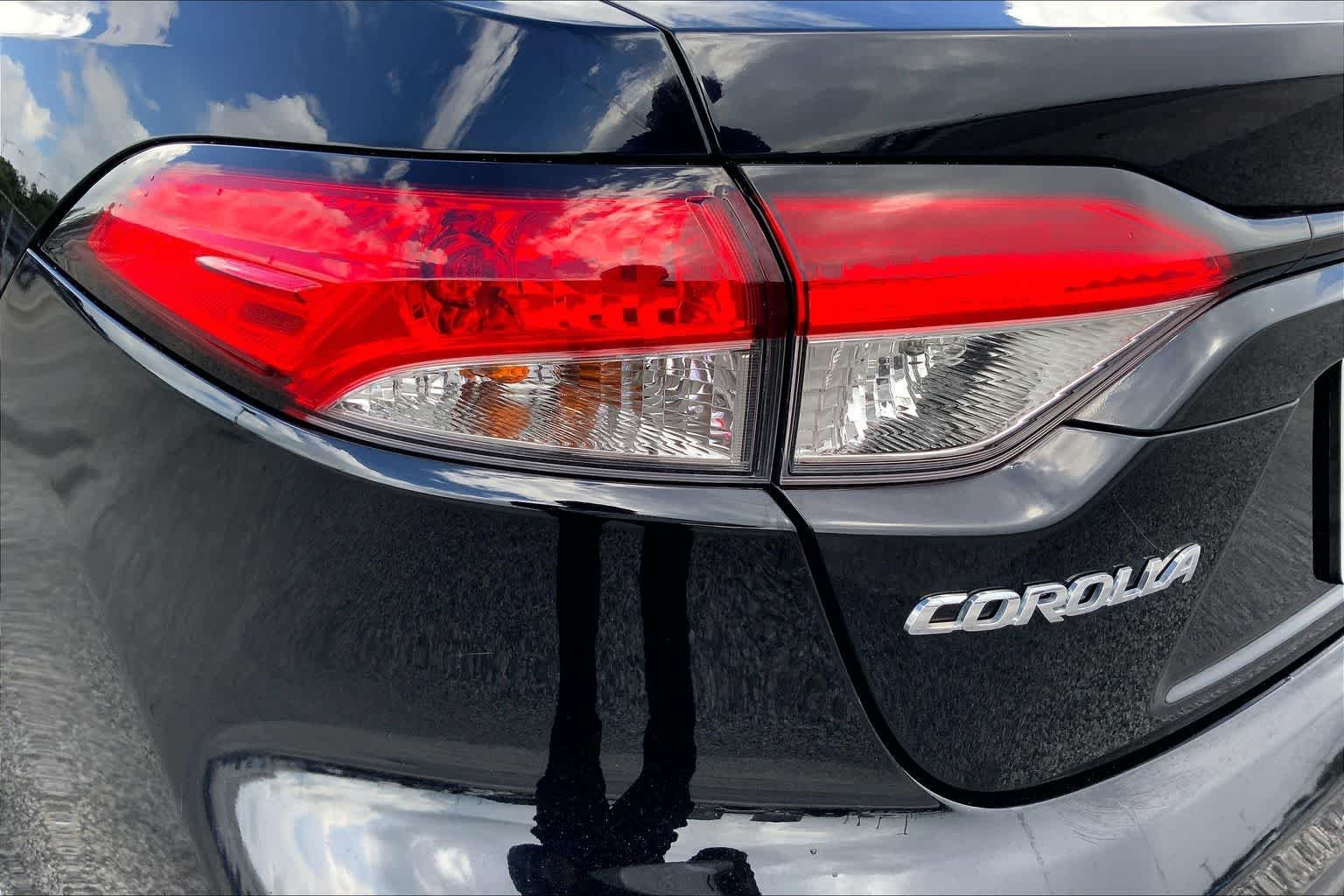Used 2024 Midnight Black Metallic Toyota LE image 28
