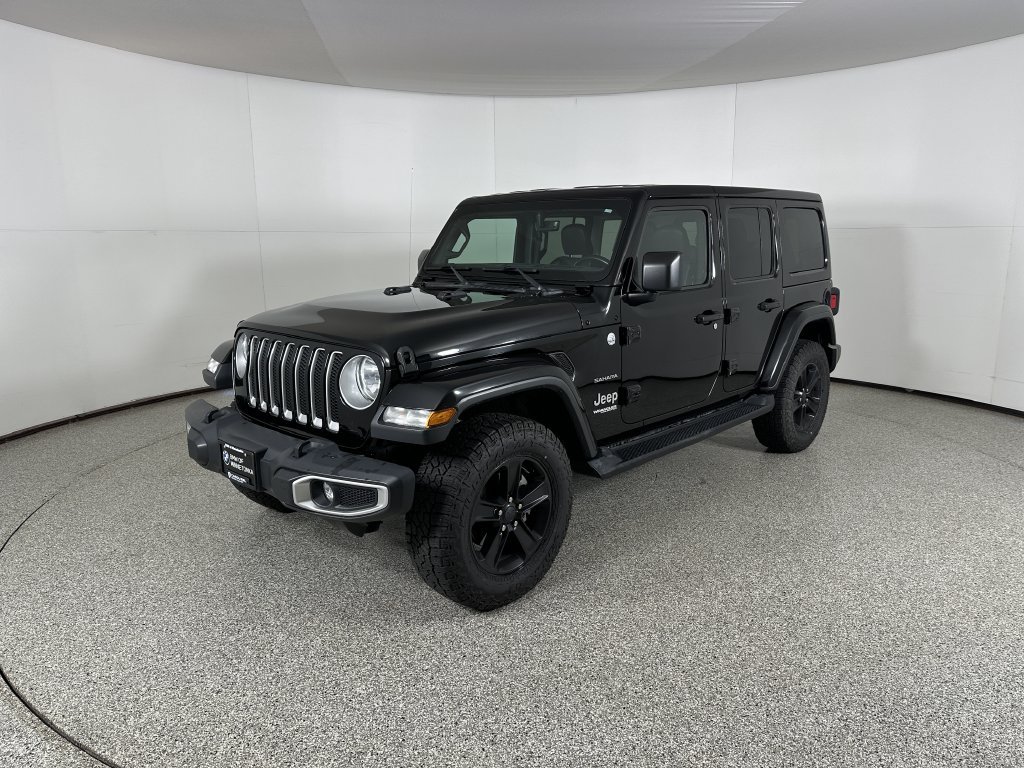 Used 2018 Black Jeep Unlimited Sahara image 1