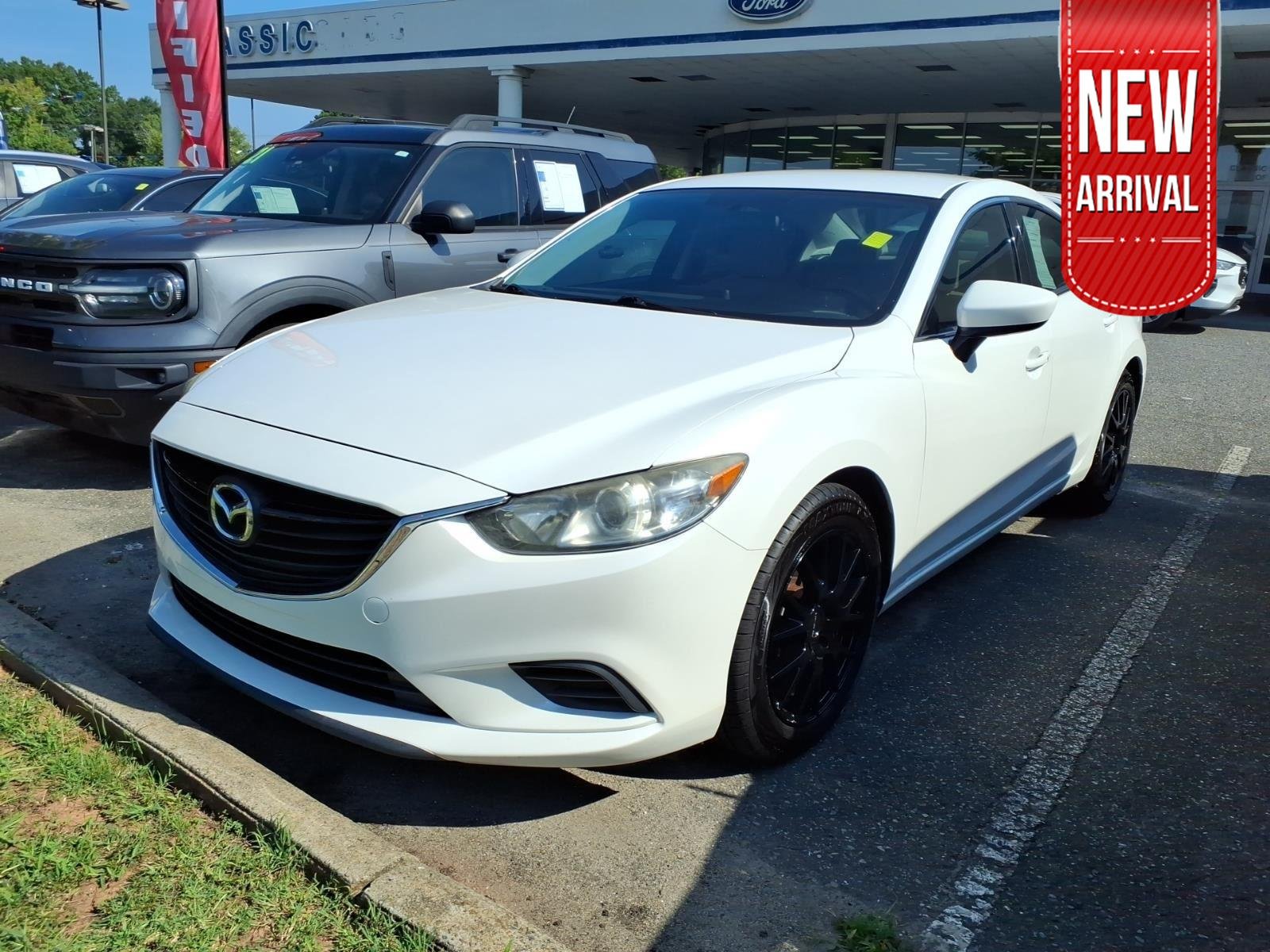 Used 2016 Snowflake White Pearl Mica Mazda i Touring image 1