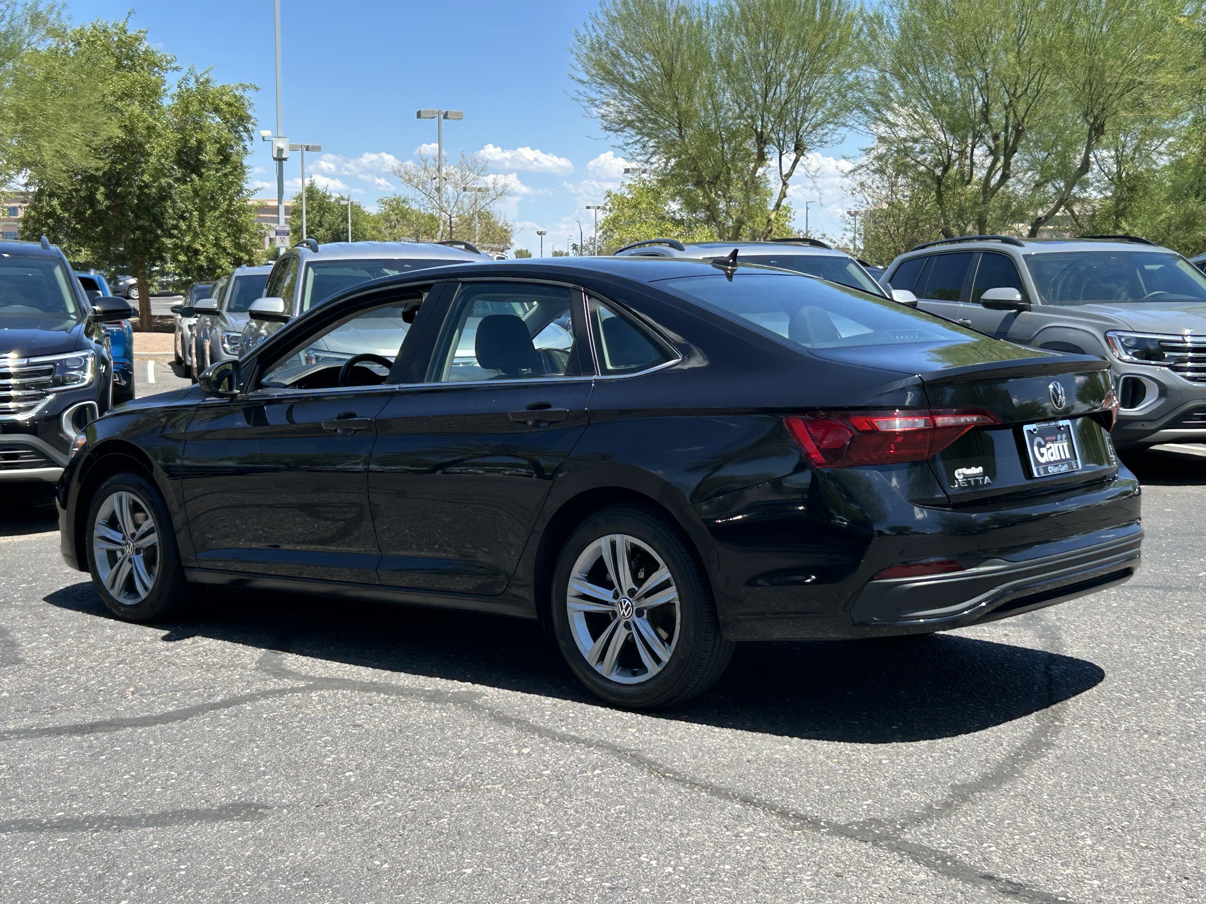 Used 2024 Black Volkswagen SE image 3