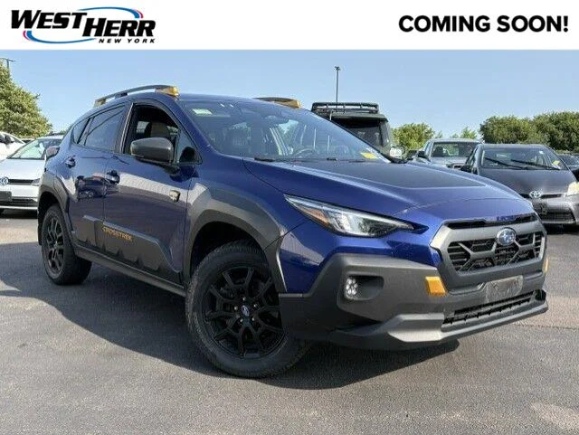 Used 2024 Sapphire Blue Pearl Subaru Wilderness image 1