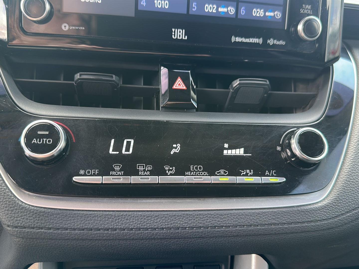 Used 2022 Blue Crush Metallic Toyota LE image 17