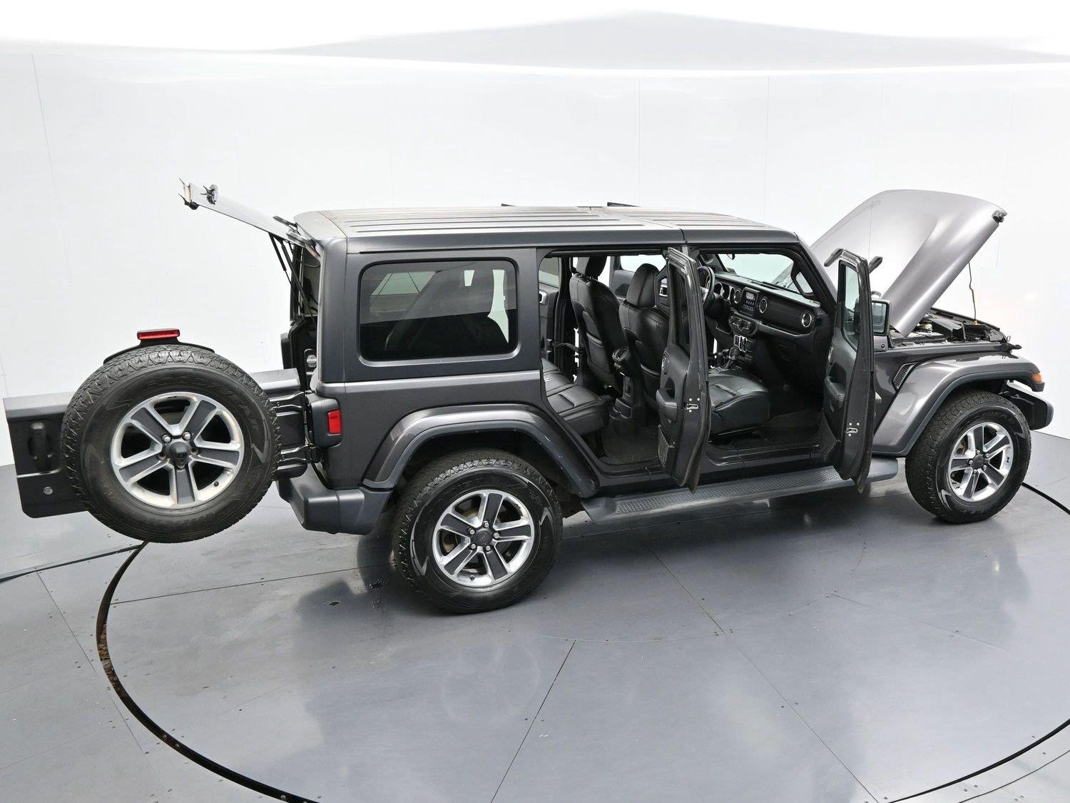 Used 2018 Granite Crystal Metallic Clearcoat Jeep Sahara image 39