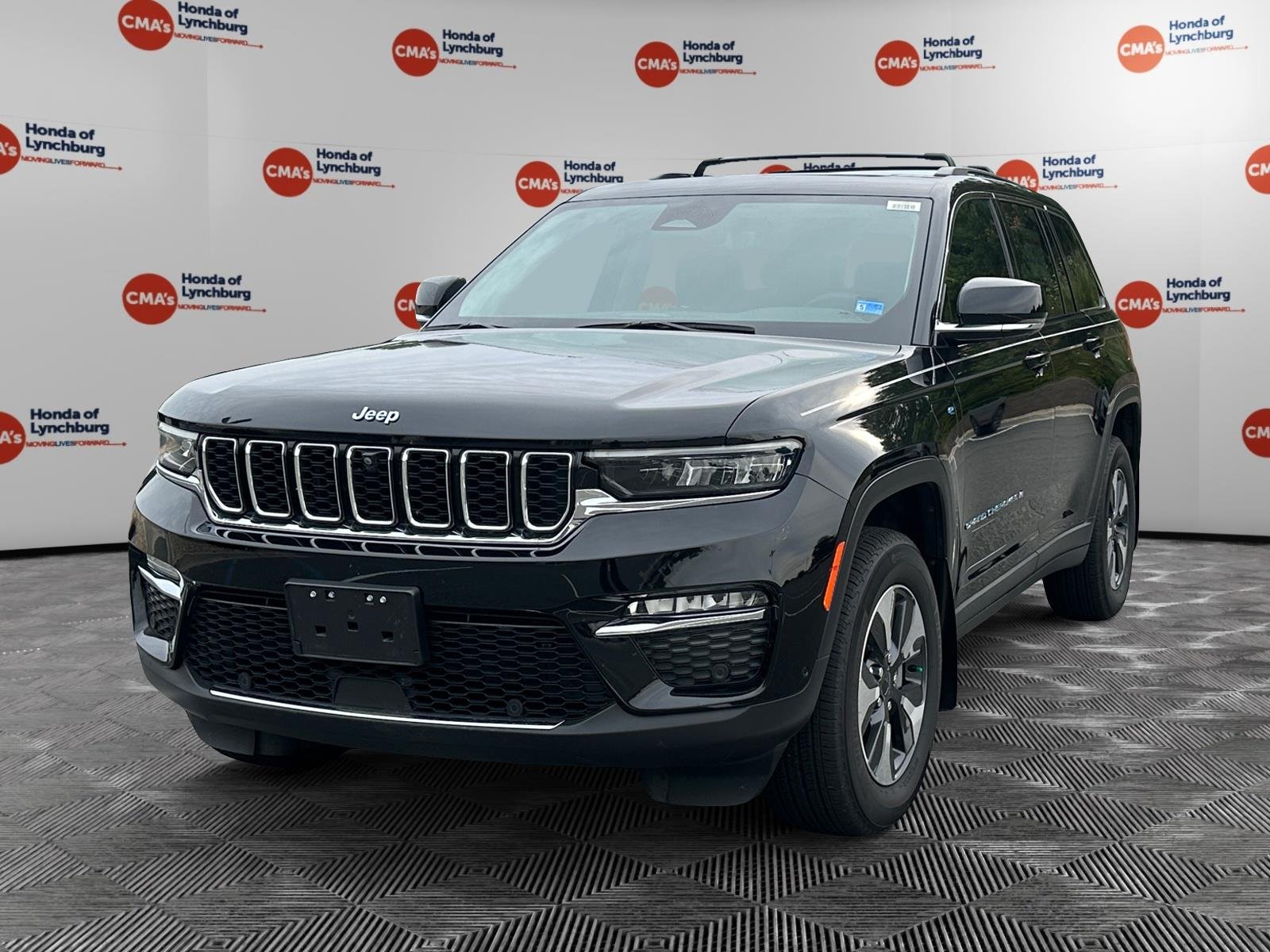 Used 2024 Diamond Black Crystal Pearlcoat Jeep LIMI image 1