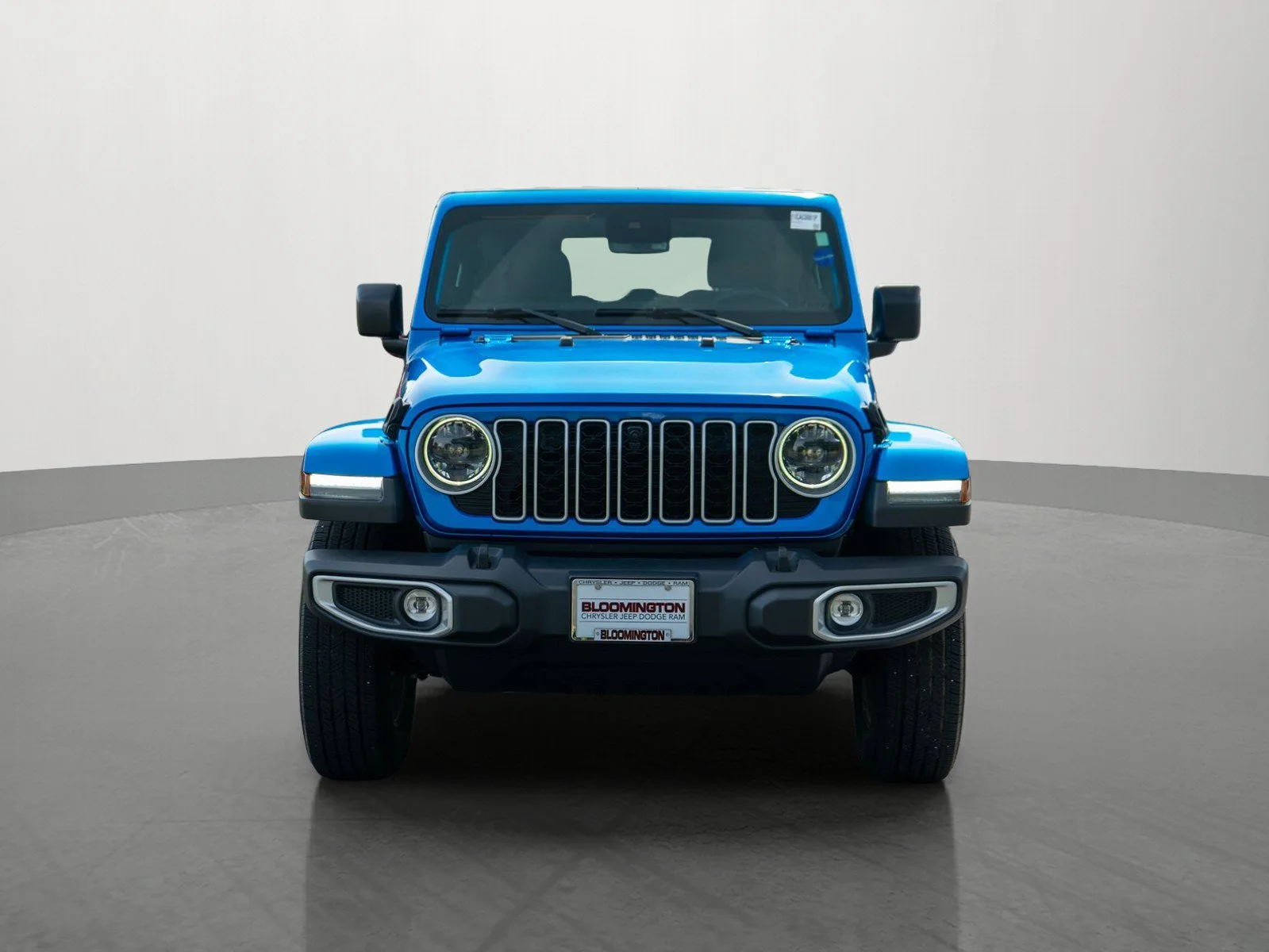 Used 2024 Jeep Wrangler 4-Door Sahara with VIN 1C4PJXEG6RW324087 for sale in Minneapolis, Minnesota