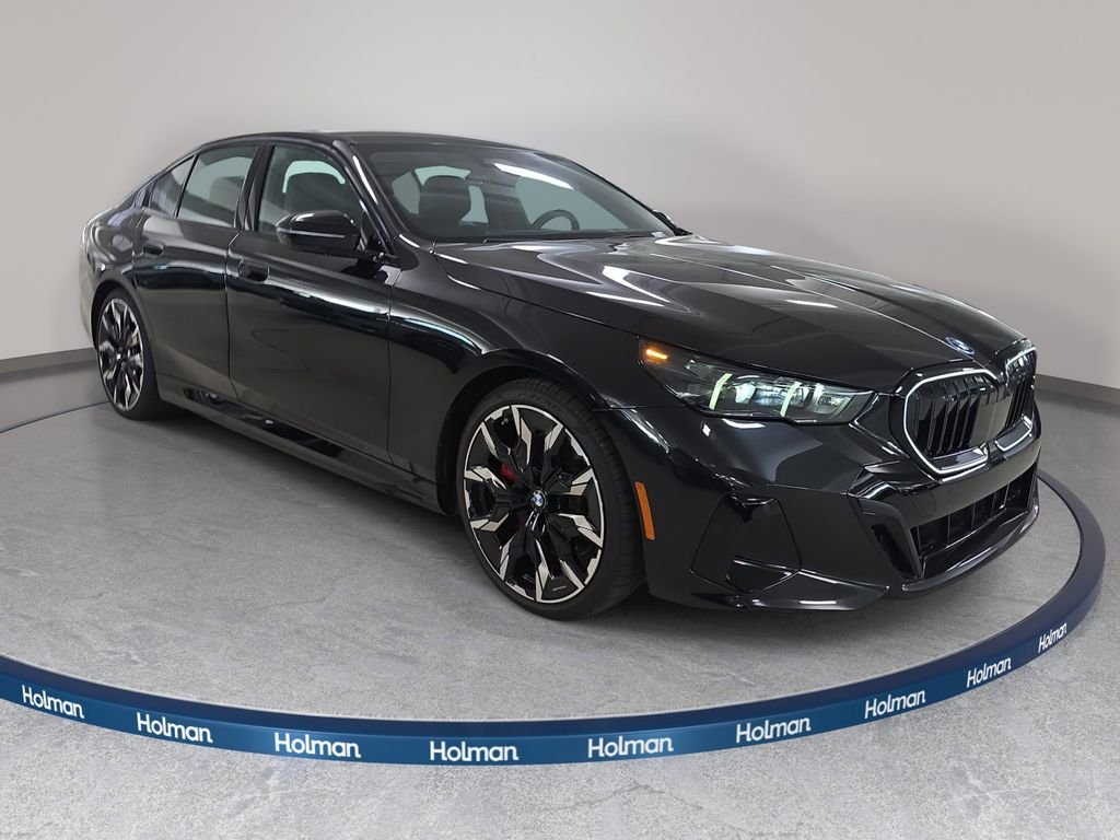 New 2027 Black Sapphire Metallic BMW 550e xDrive image 3