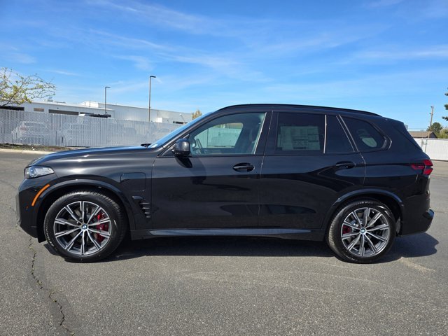 New 2026 Black Sapphire Metallic BMW xDrive50e image 35