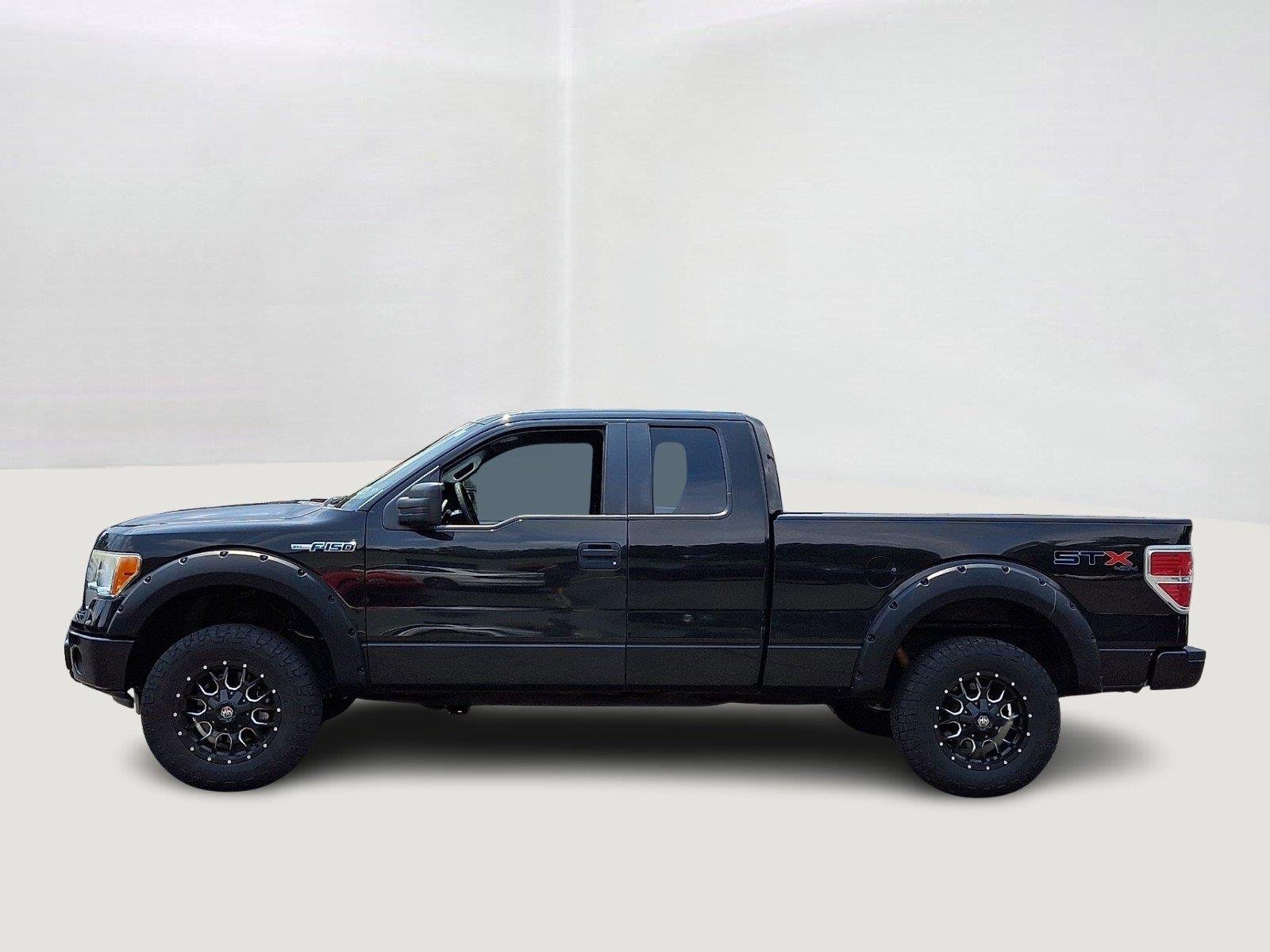 Used 2013 Tuxedo Black Metallic Ford STX image 4