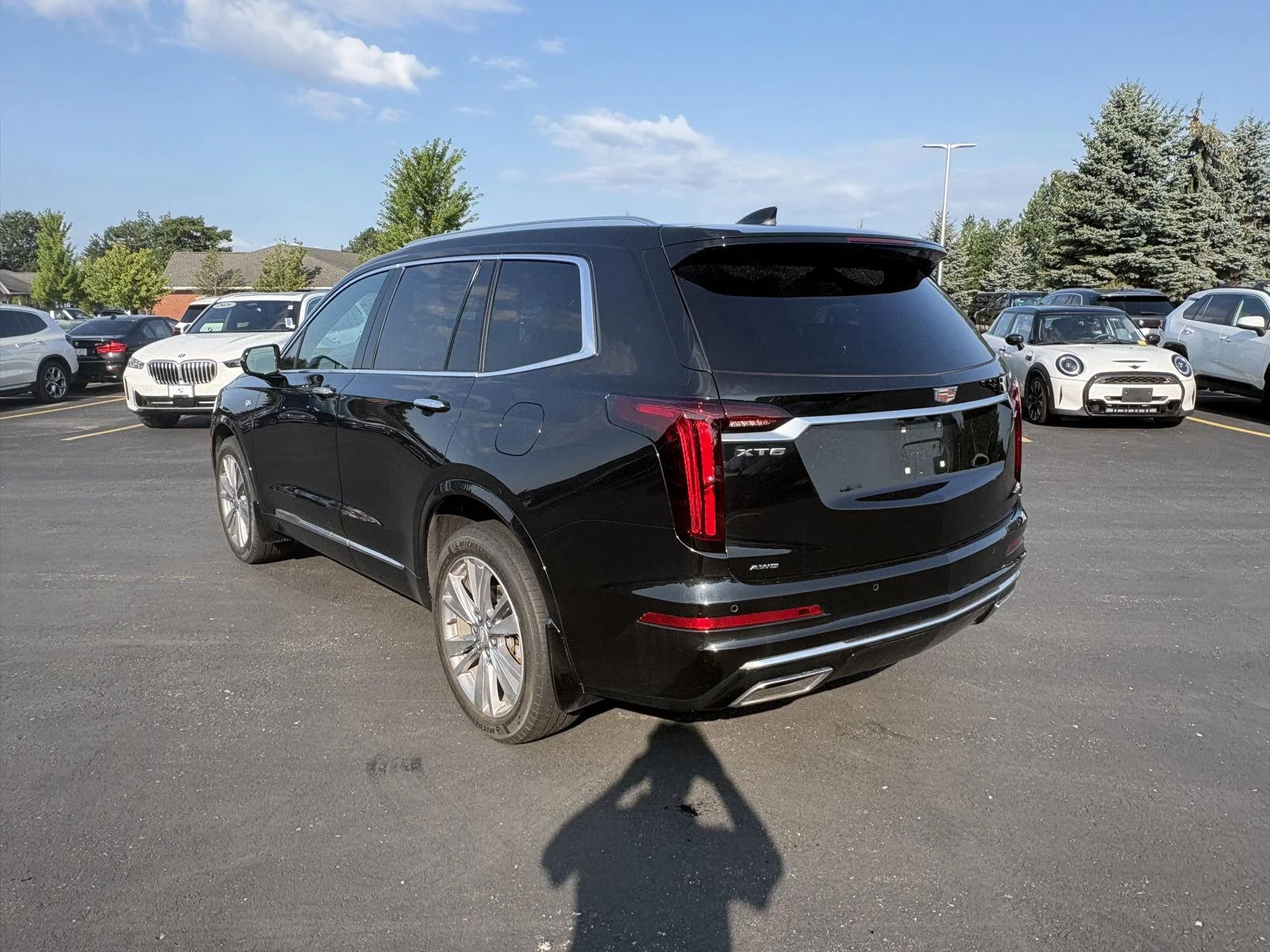 Used 2024 Stellar Black Metallic Cadillac AWD Premium Luxury image 3