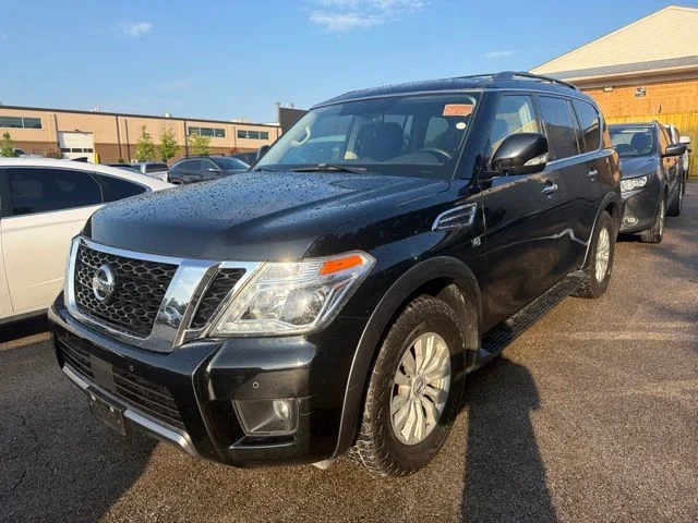Used 2019 Super Black Nissan SV image 1