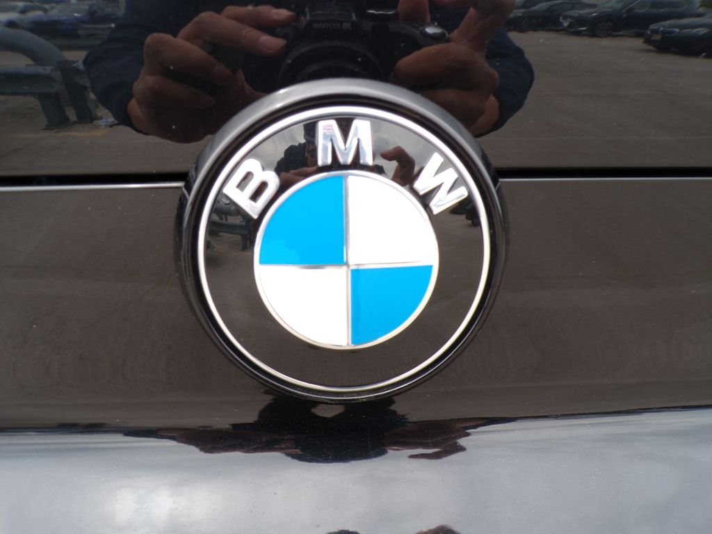 Certified Used 2024 Black Sapphire Metallic BMW M60i image 26