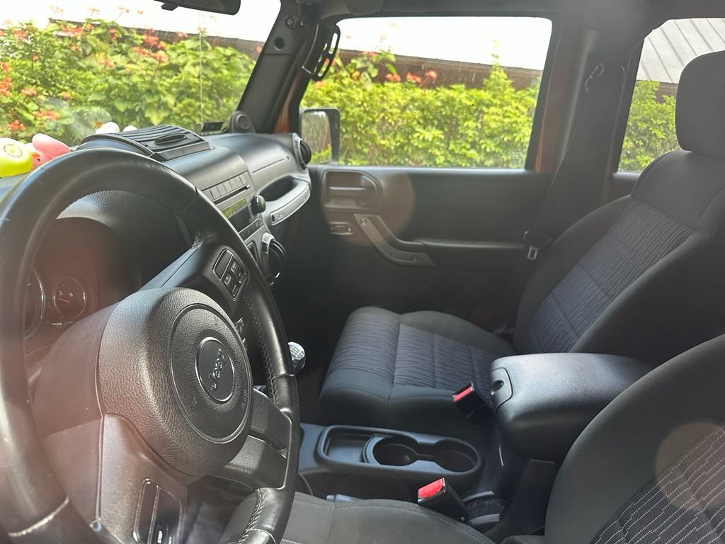 Used 2011 Mango Tango Pearl Jeep Sport image 2