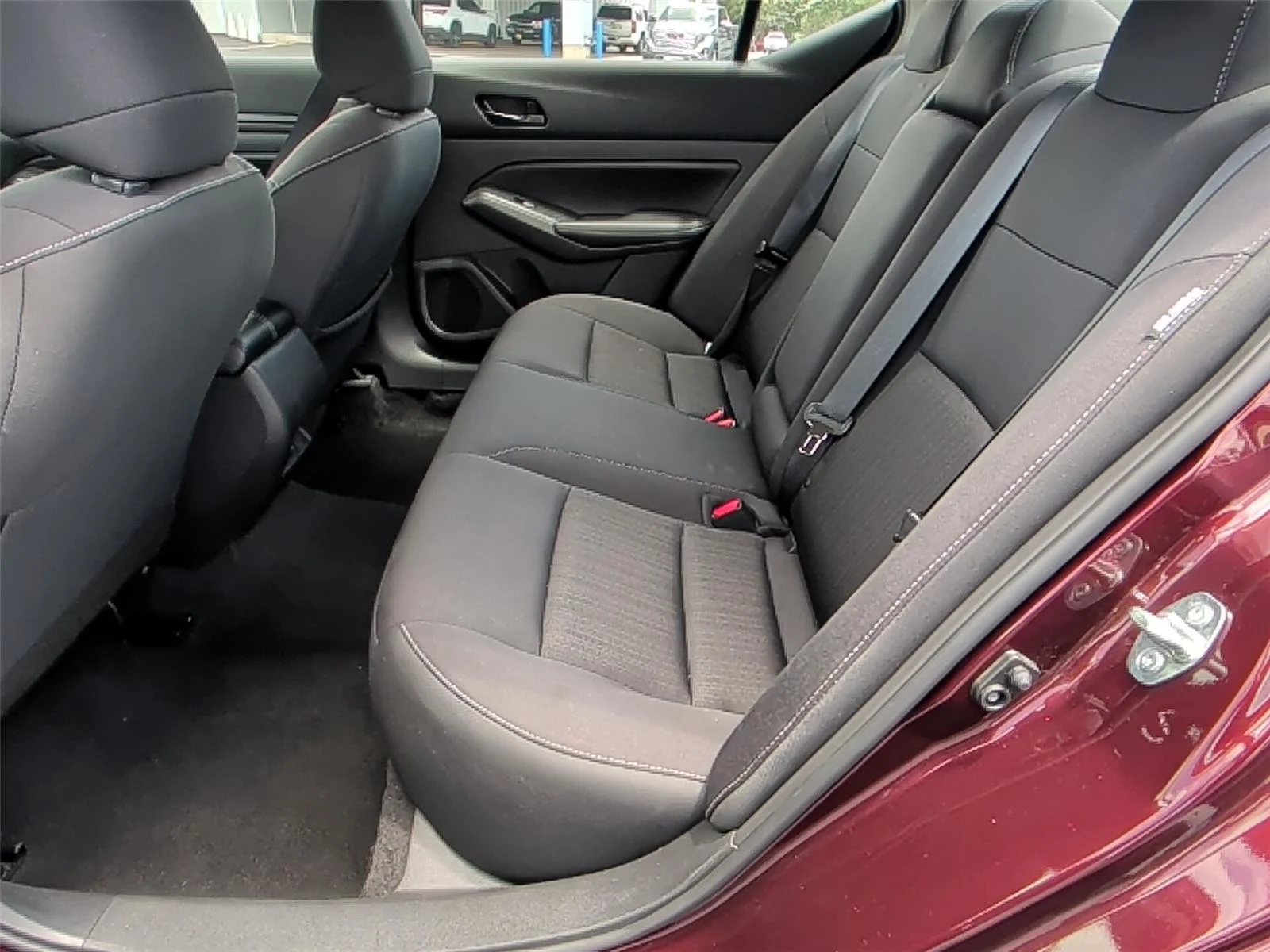 Used 2025 Garnet Pearl Metallic Nissan SV image 31