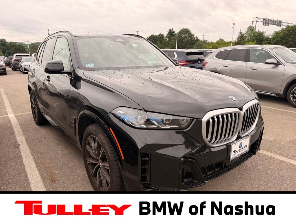 Used 2026 Black BMW xDrive40i image 1