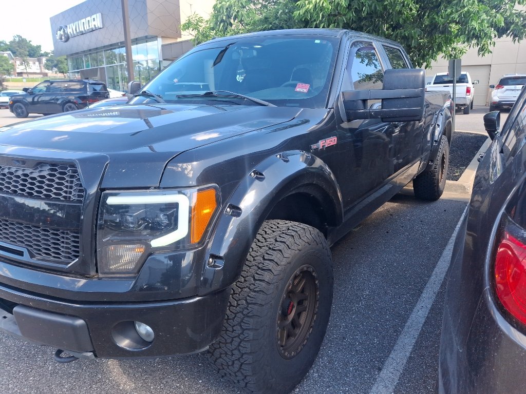 Used 2012 Tuxedo Black Metallic Ford FX4 image 1