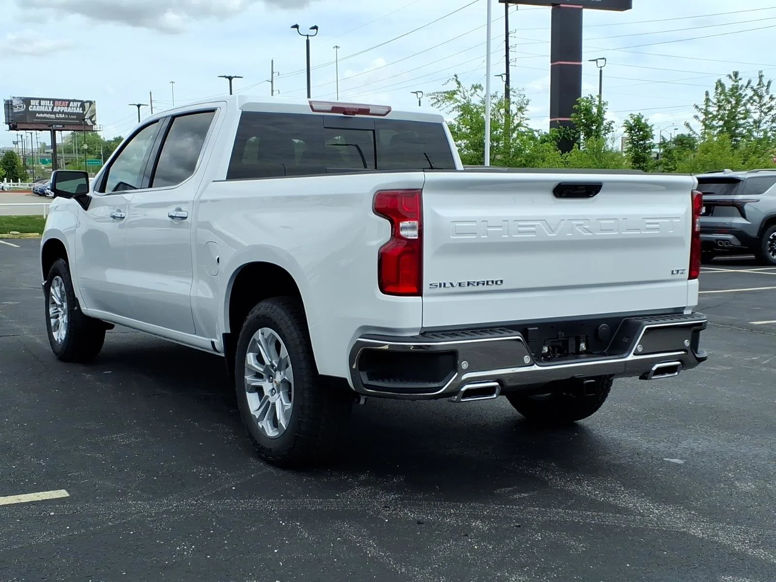 New 2026 Summit White Chevrolet LTZ image 3