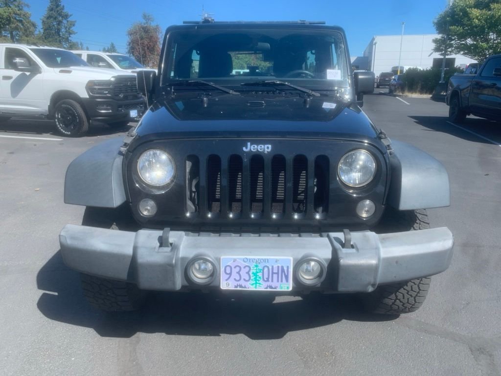 Used 2016 Black Clearcoat Jeep Unlimited Sport image 6