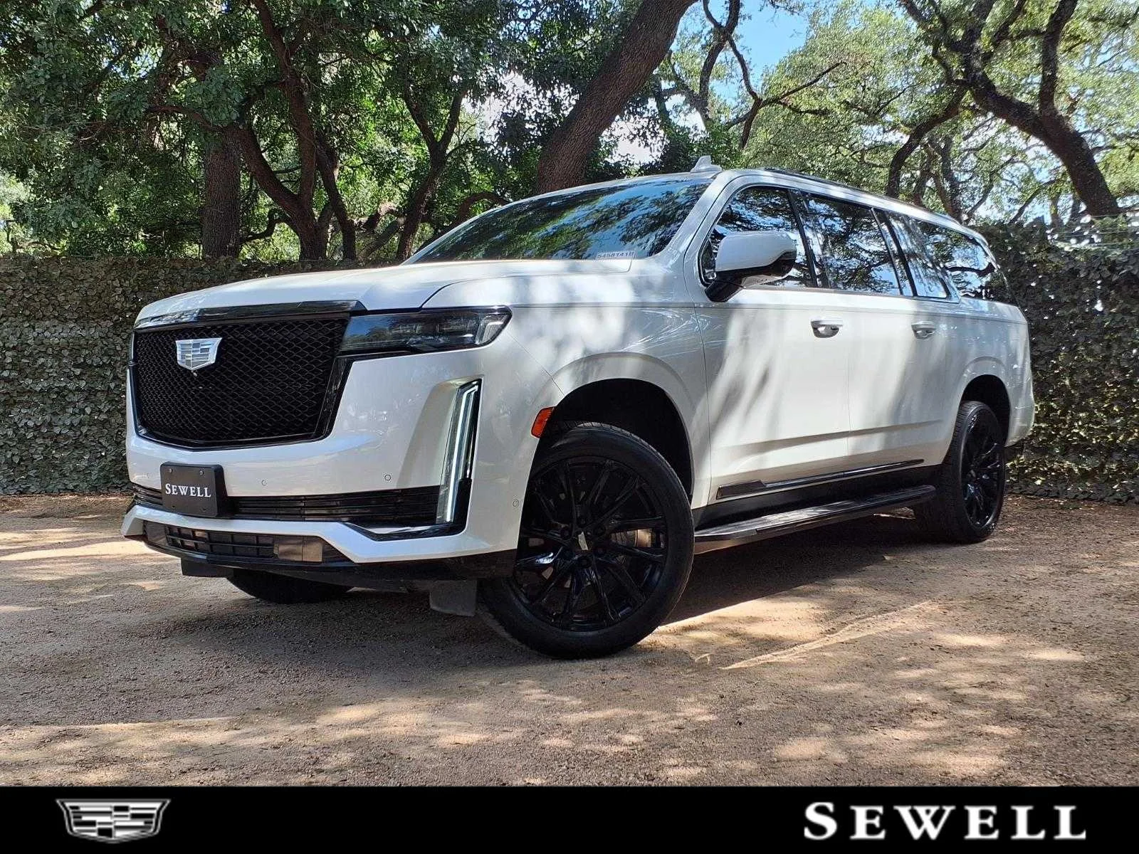 Used 2021 CRYSTAL WHITE TRICOAT Cadillac Sport image 1