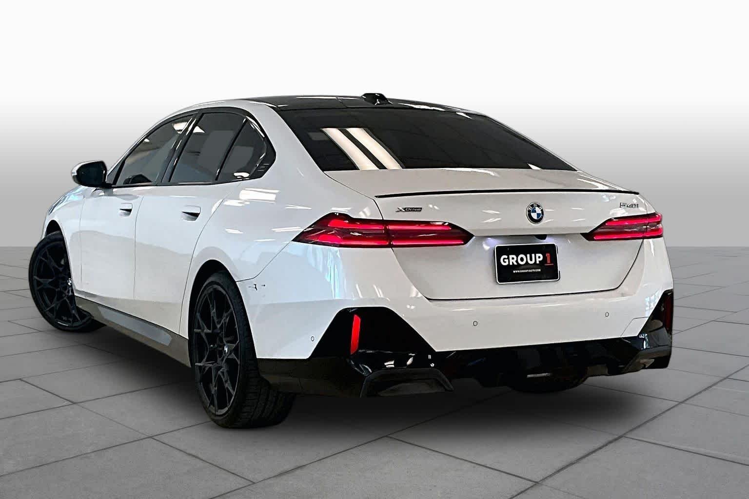 Used 2024 Mineral White Metallic BMW 540i xDrive image 11