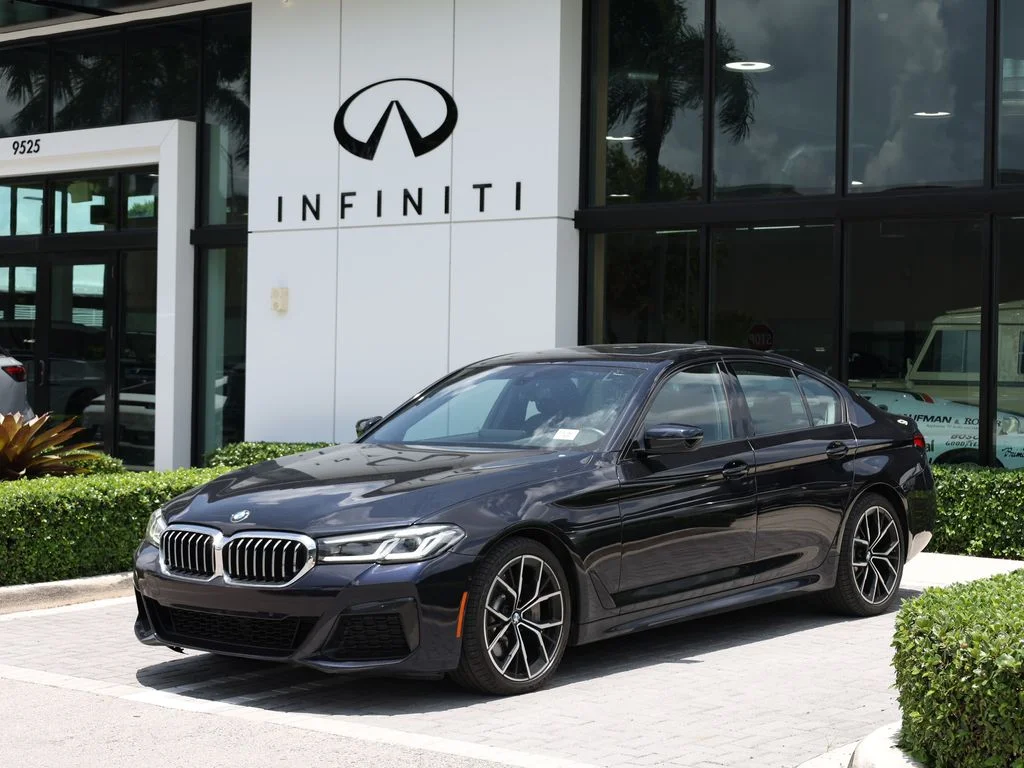 Used 2023 Black BMW 530i xDrive image 1