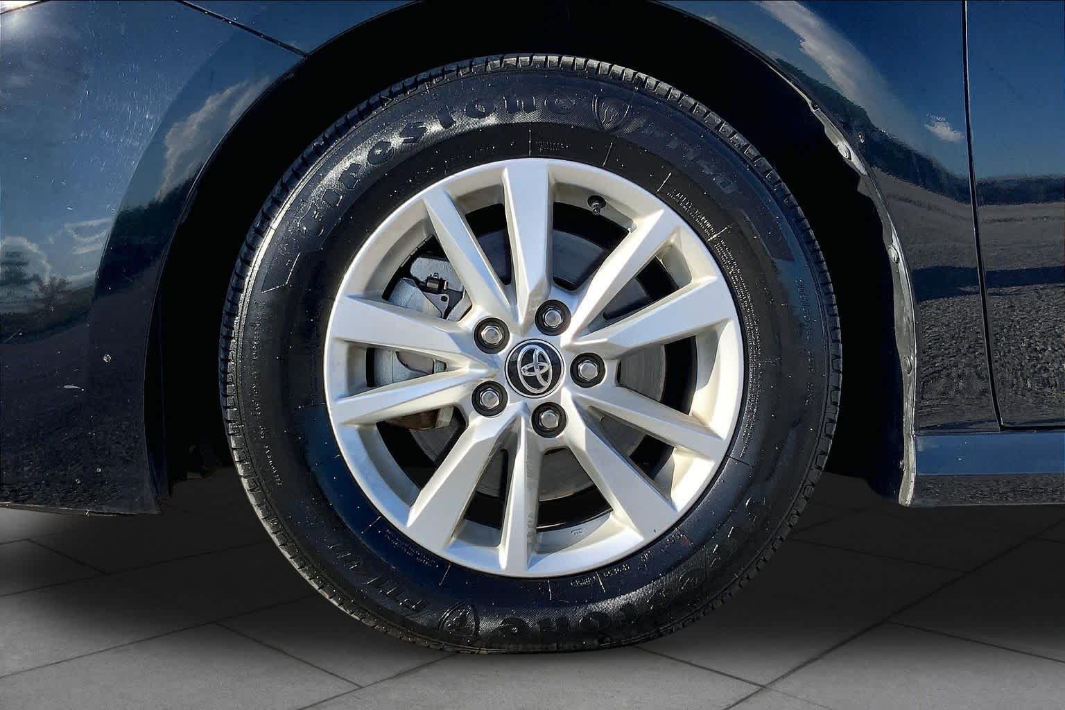 Used 2025 Midnight Black Metallic Toyota LE image 11