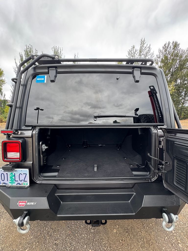 Used 2018 Granite Crystal Metallic Clearcoat Jeep Unlimited Sport S image 12