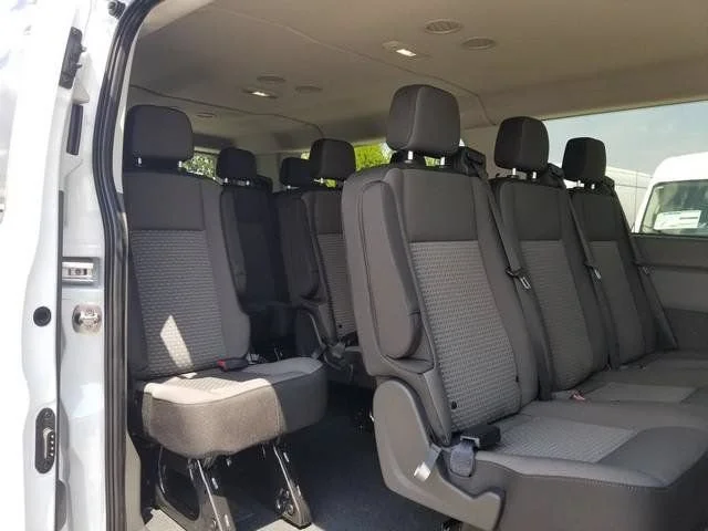 New 2026 Oxford White Ford Passenger Van XLT image 5
