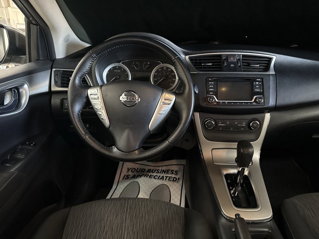 Used 2015 Gun Metallic Nissan SV image 19